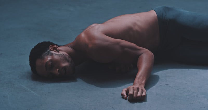 Black Man Dancer Lying Down Floor By Hans Peter Schepp Stock