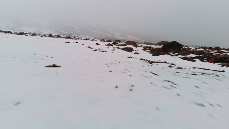 snow covered rocky terrain aerial 