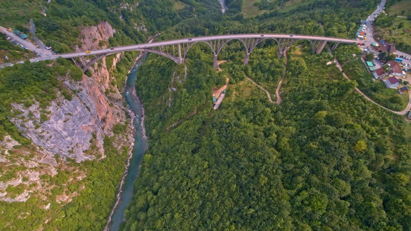 cars driving over a bridge aerial