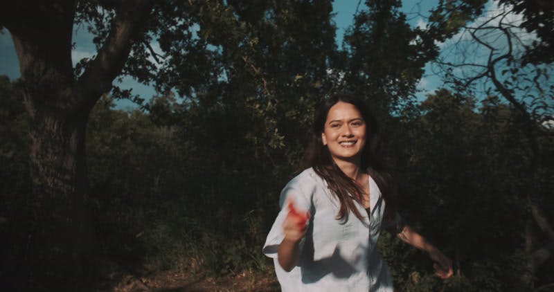 woman-water-gun-water-fight-running