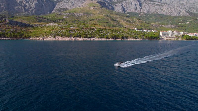 Mountains, Foam, Boat, Sea by Anton Katliar – Stock Footage | Artlist