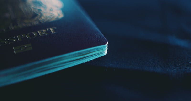 A close-up of a U.S. passport on a desk