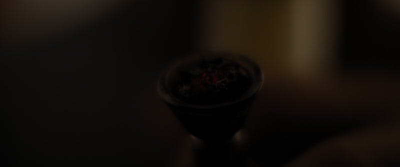 weed burning in a bong 