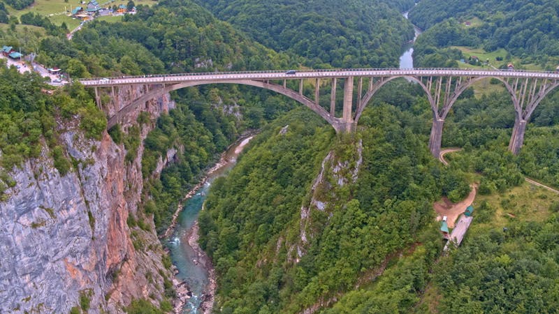 river flowing underneath a bridge aerial  