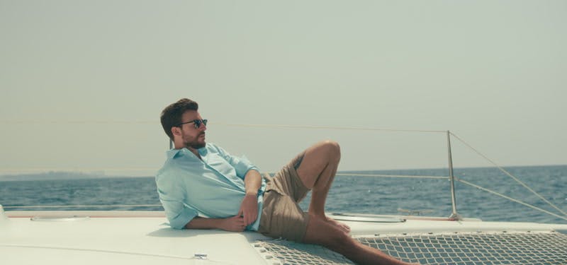 man-boat-ocean-water-by-omri-ohana-stock-footage-artlist