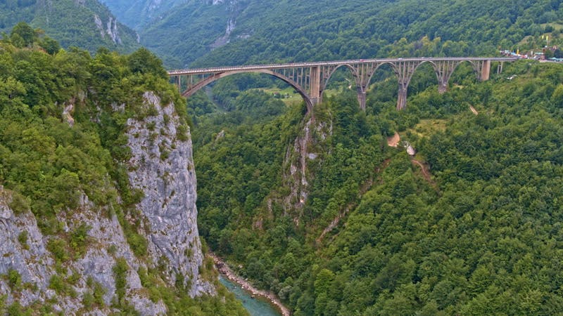 large bridge crossing a canyon aerial 