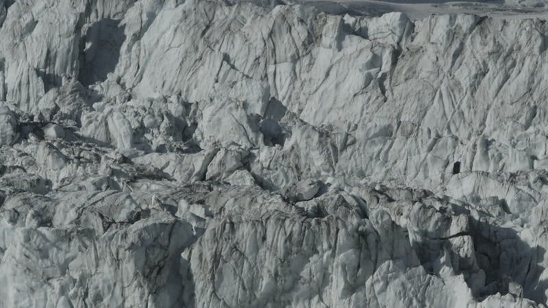 ice and snow packed in a glacier 